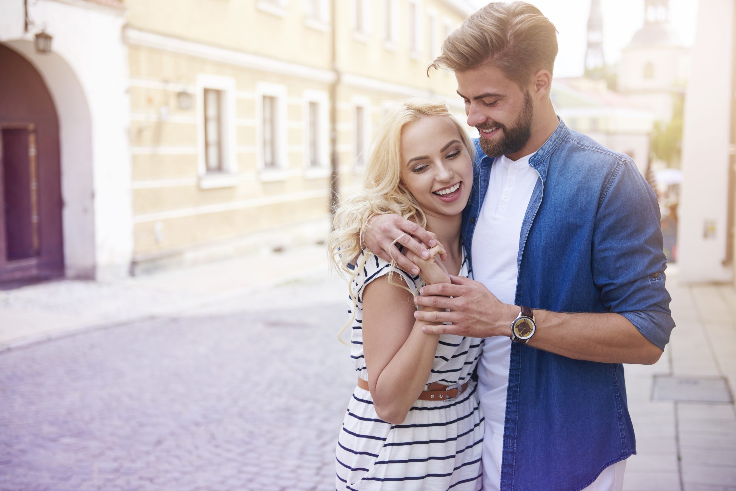 Blonde woman and man on the city street